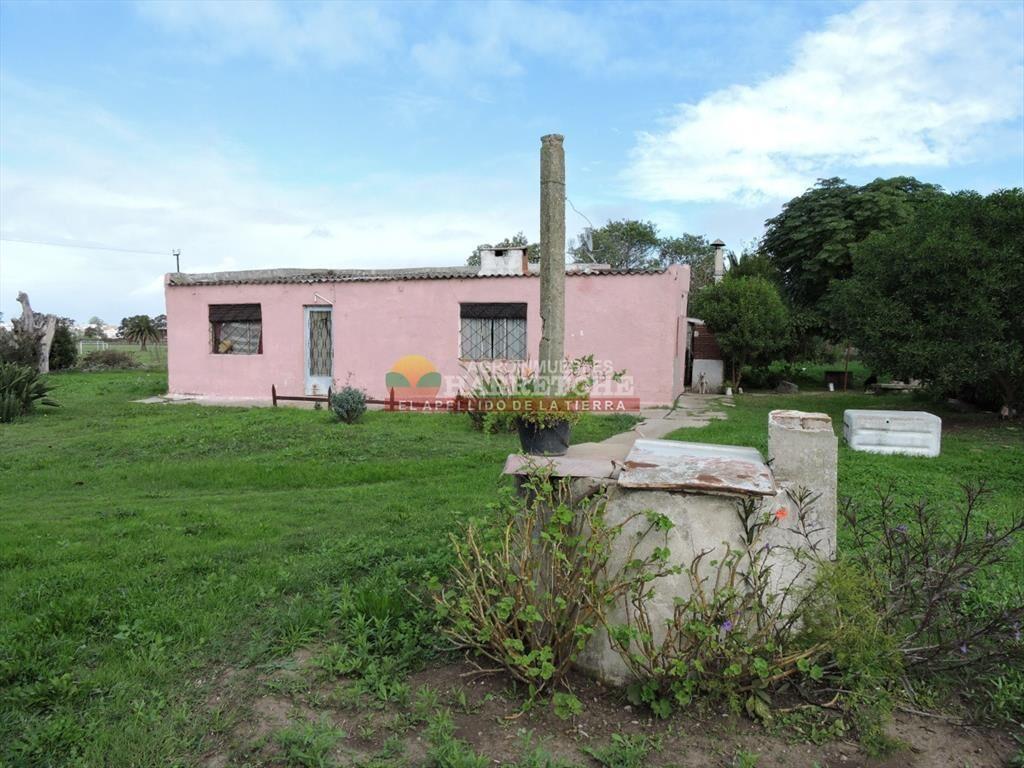 Casa con terreno en venta a pasitos de ruta 1, de
