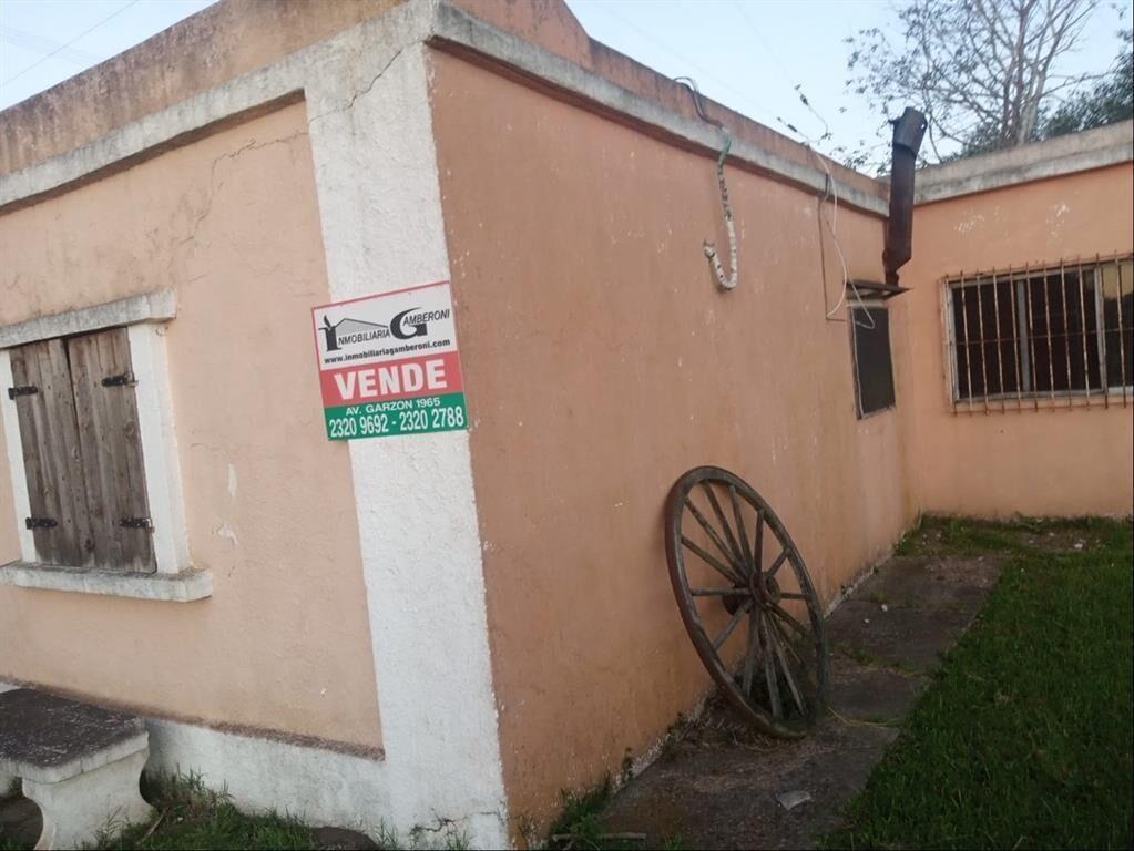 Terreno tipo chacra con casa y galpónes, con 205 m de frent
