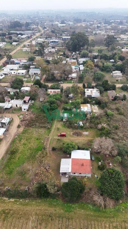 Venta terreno grande con mejoras barros blancos 5 casas
