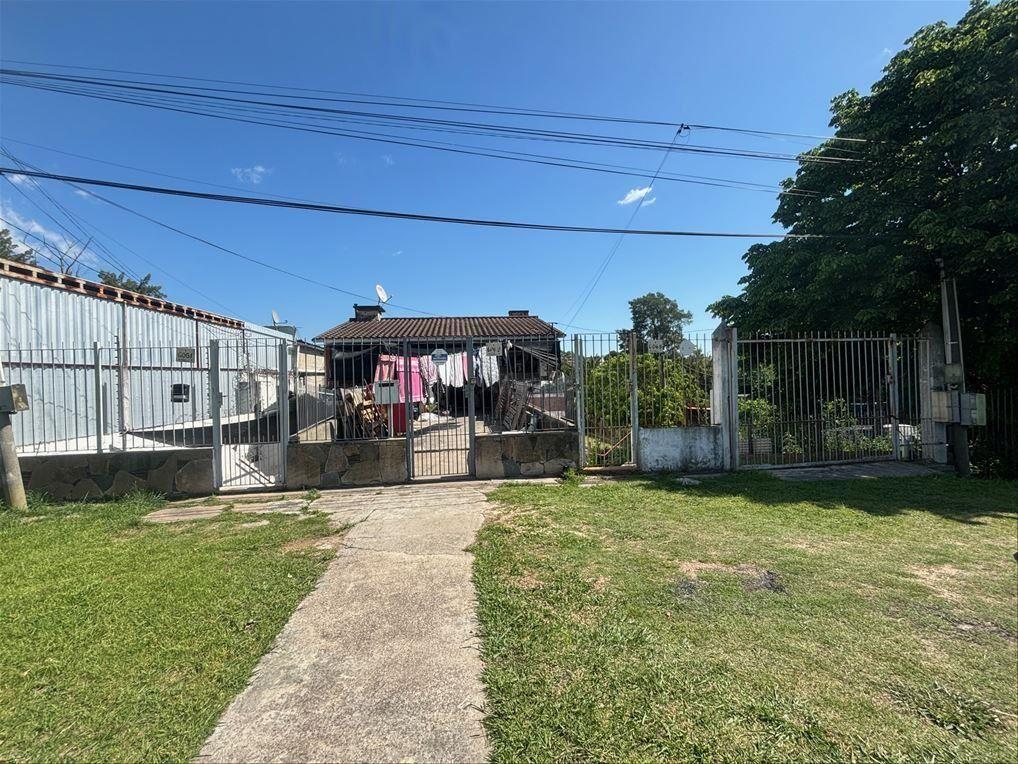 Local tipo galpón, 100 m2 edificados mas casa (Oficina)