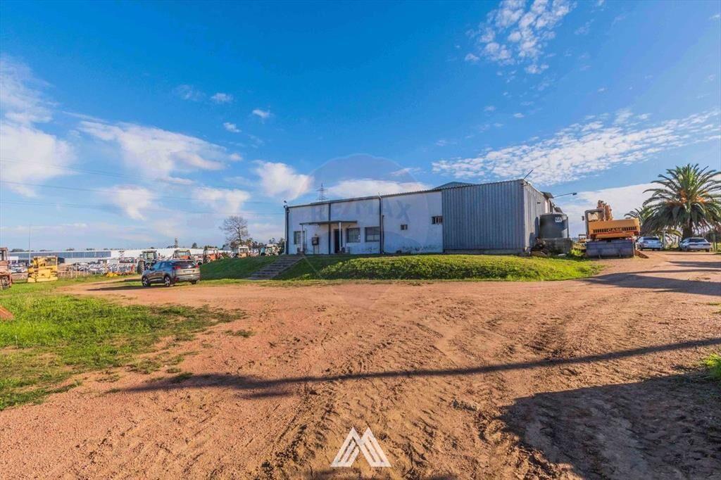 VENTA DE TERRENO CON DEPÓSITOS-OFICINAS RUTA 1