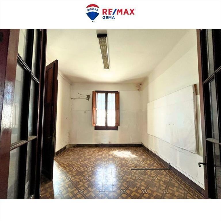 Casa con local comercial en plena Av. España