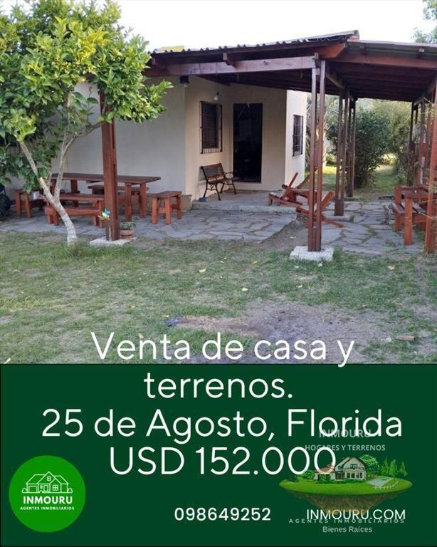 Venta de casa con terrenos en 25 de Agosto, Florida