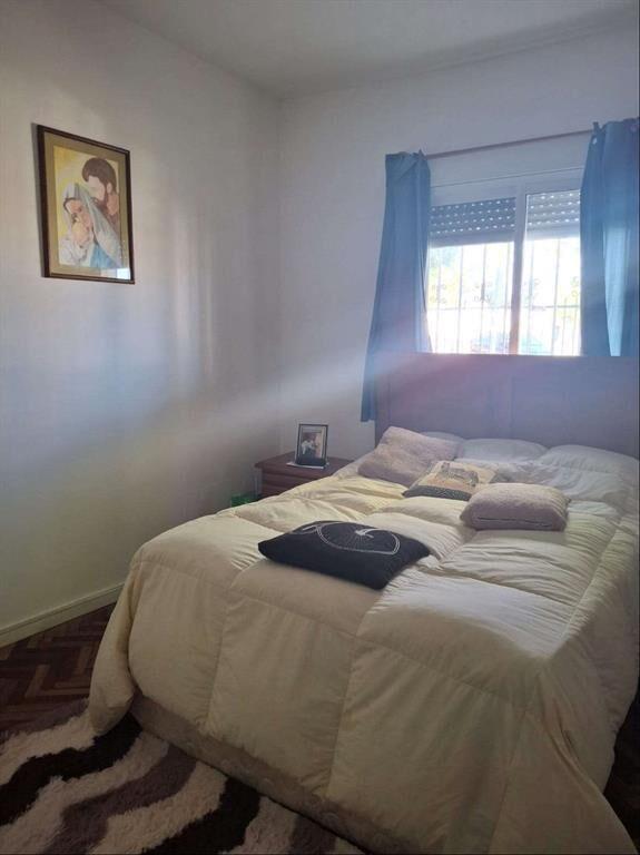 Venta de apartamento tipo casa, 2 dorm, patio, jardín, coch