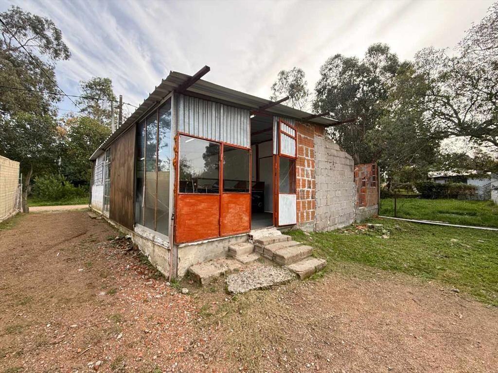 Venta Terreno con construcción Santa Ana