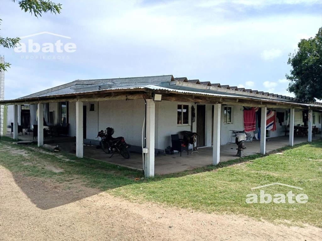 Venta de Terreno campo con mejoras en Est. Atlántida a metr