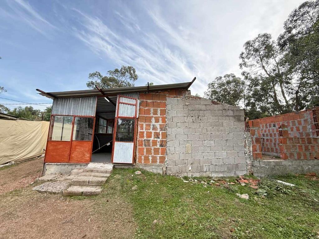 Venta Terreno con construcción Santa Ana