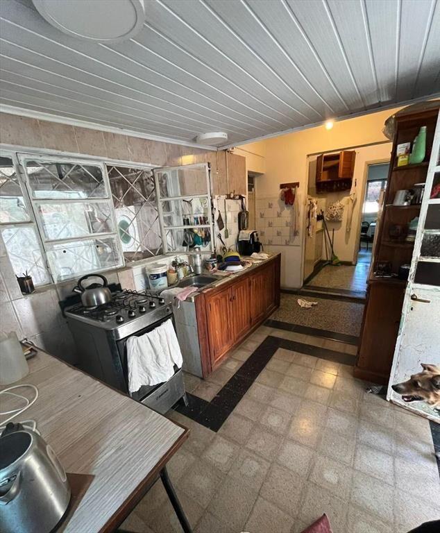 Venta tres casas en padrón único con cochera zona buceo