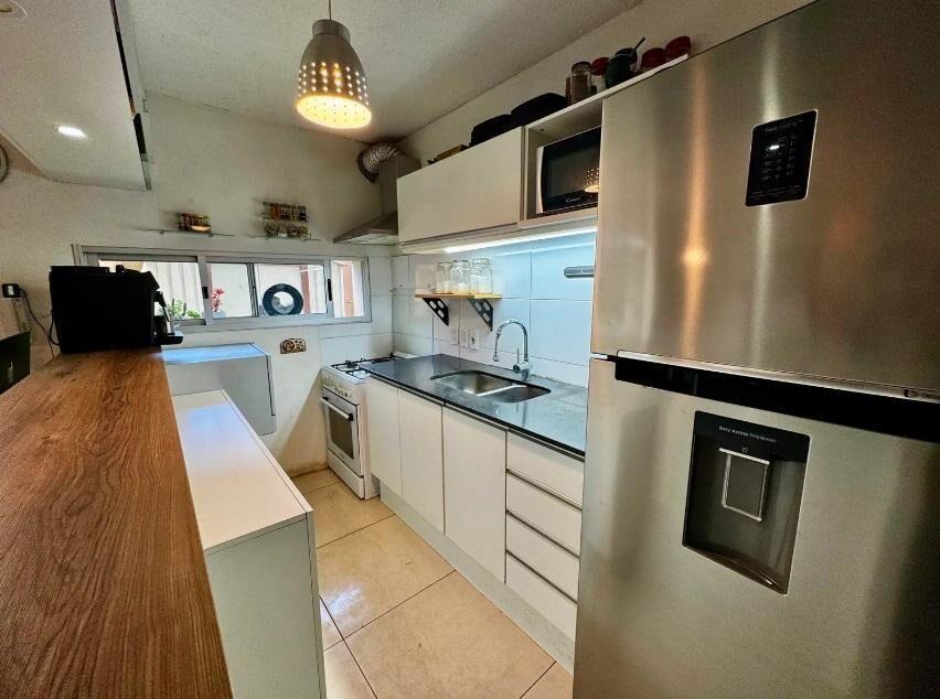 Venta de Apartamento de dos dormitorios con patio y garaje