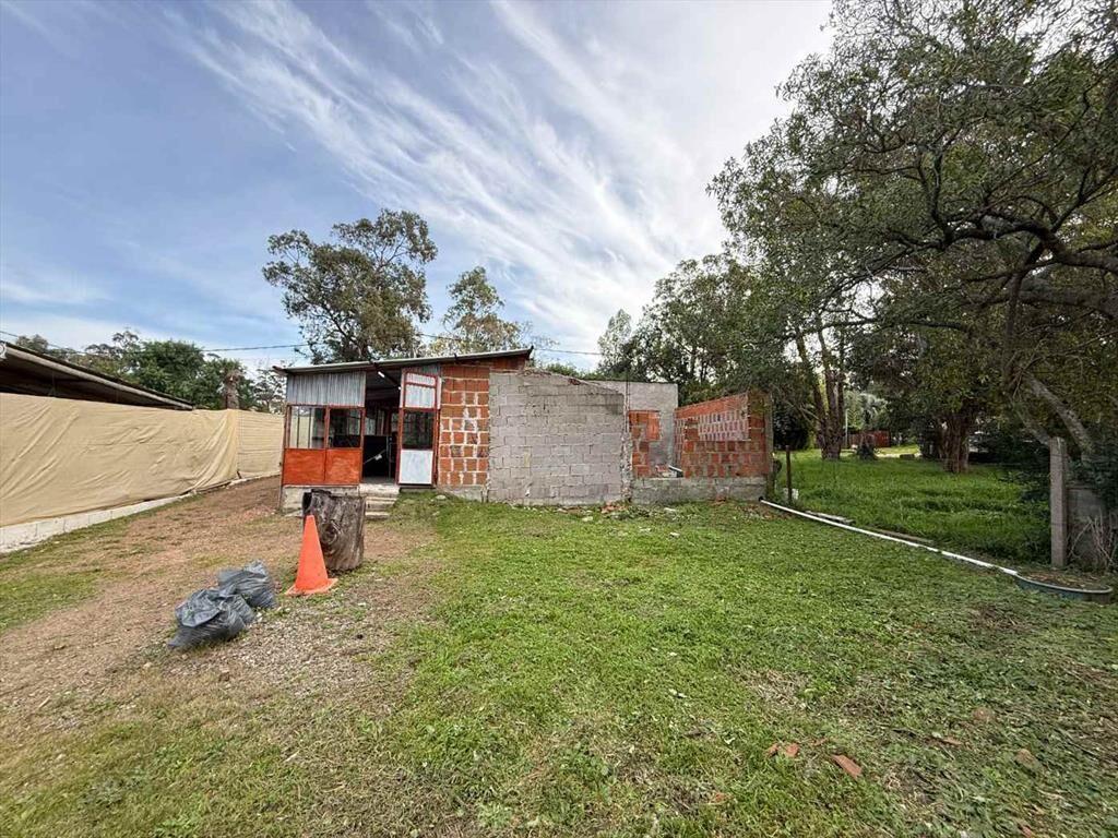Venta Terreno con construcción Santa Ana