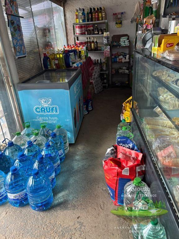 Venta de local comercial con casa en Barros Blancos