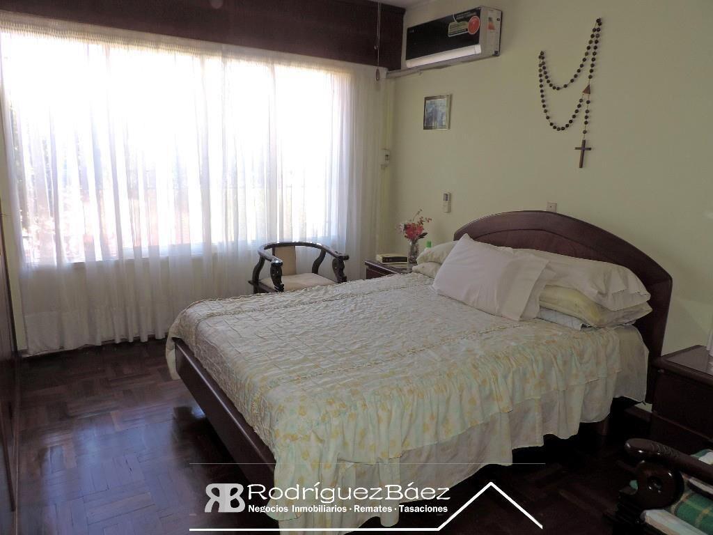 VENTA CASA 3 DORMITORIOS 2 BAÑOS FONDO VERDE GARAGE JARDIN