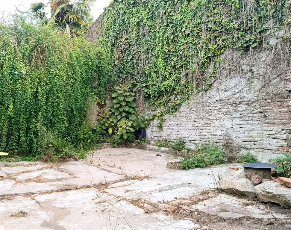 Venta de terreno con construcción en Pando