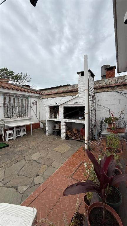 Venta tres casas en padrón único con cochera zona buceo
