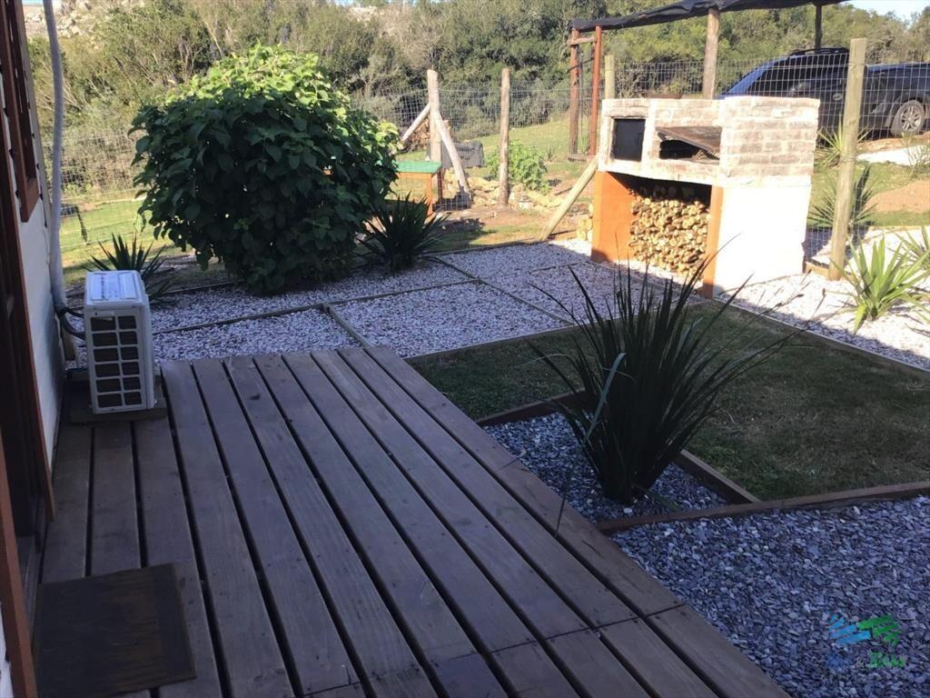 Muy linda chacra con casa, arbolada y bien