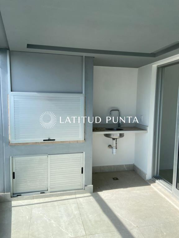 Piso alto en Mansa, 2 dormitorios y parrillero
