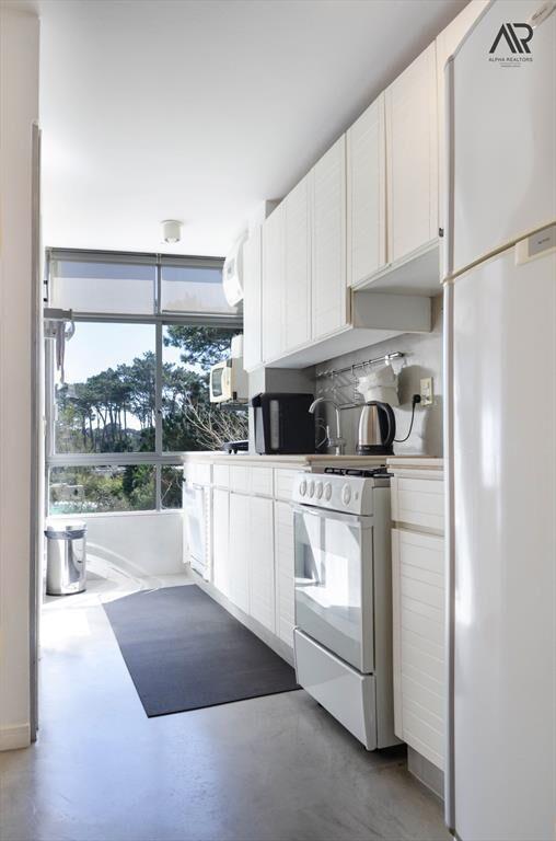 Apartamento en venta c/ cochera en Lugano