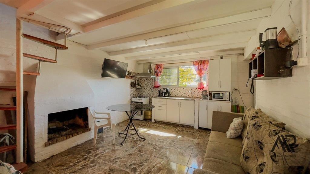 Venta Terreno mas 3 propiedades c/ cochera en Bello Hori...
