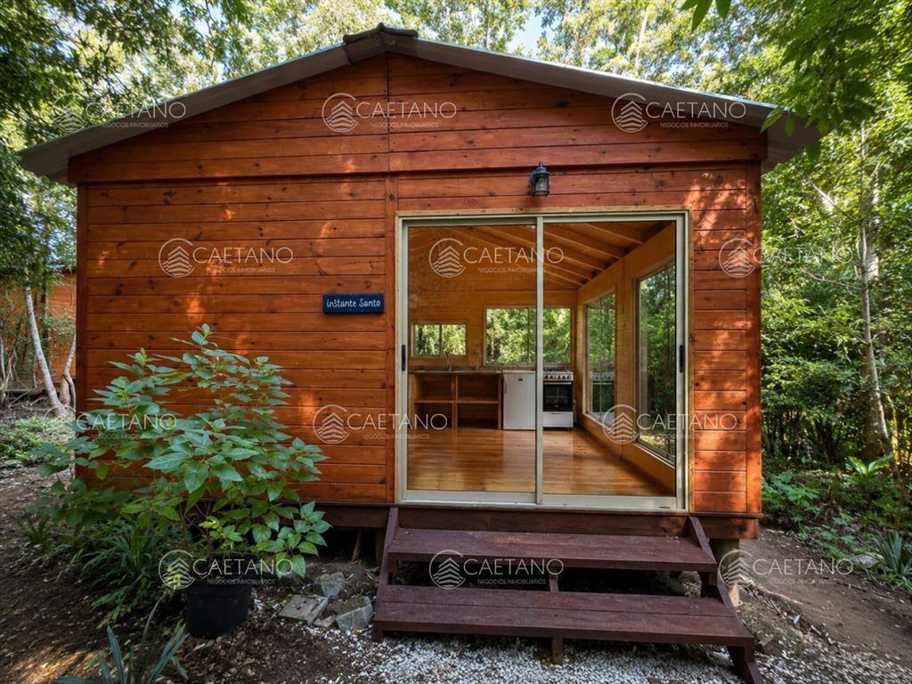 VENTA DE TERRENO CON 2 CABAÃ?AS PUNTA BALLENA-LAS
